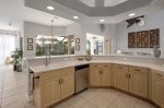 Large Kitchen with Waterviews of Pool and Patio